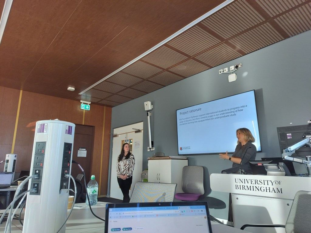 Hannah Ryan and Sarah Parry presenting to the forum